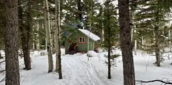 Hut in snowy distance