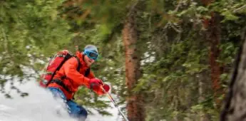 Dan Zokaites skiing trees above North Pole Hut